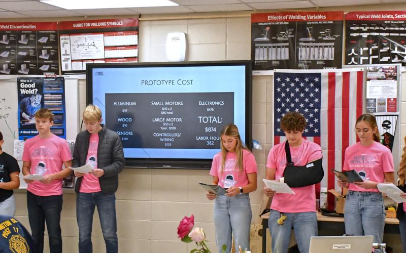 Webster Area Robocats team gives a presentation Nov. 16 to community members giving a breakdown of the time and fundraising invested into their club. Robocats members are, from left, Jocelyn Rumpca, Jackson Baumgarn, Grady Wagner, Kenley Grewe, Gavon Larson, Marlee Dornbusch and Kala Kwasniewski. Reporter &amp; Farmer | Connor Handrahan