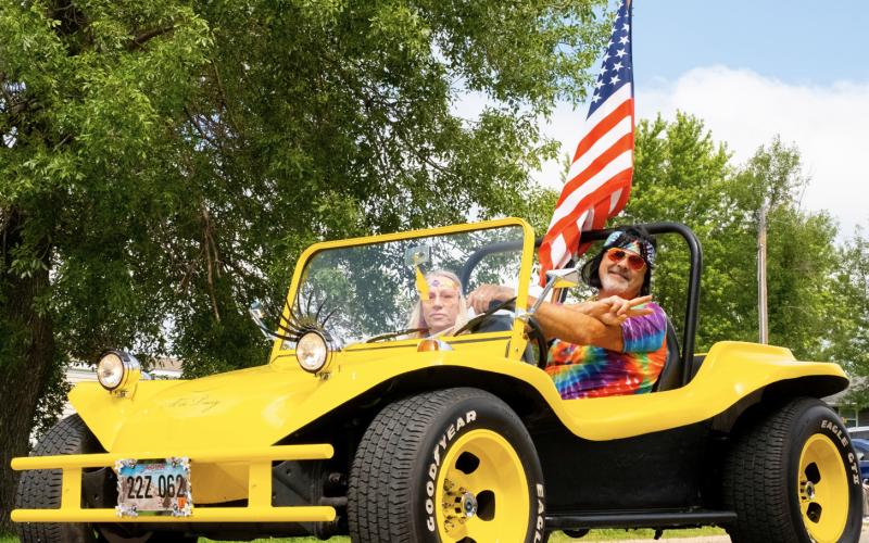 Parade participants, Vicki and Mark Kampa of Webster ride in their dune buggy July 19 at Waubay Fun Fest. The parade featured hippie and 1970s themed decorations for the festival’s feelin’ the vibe theme. Reporter &amp; Farmer | Leyton Beardslee