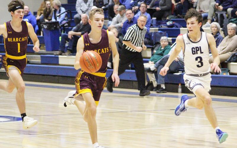 Seth Lesnar (3) rushes down the court with his teammate Blaize Amdahl (1) trailing behind him as Great Plains Lutheran defender Brody Scharlemann (3) attempts to cut off Lesnar’s route during the Feb. 4 matchup between the Bearcats and the Panthers. Webster Area lost 45-59. Reporter &amp;amp; Farmer | Subscriber Snapshot