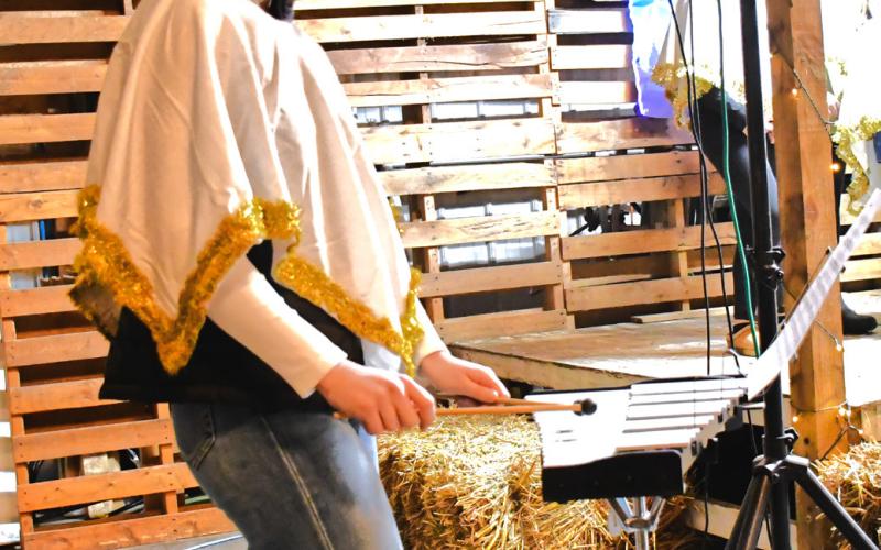 Chloe Mammenga played the xylophone during Bergen Church’s celebration reenacting the birth of Jesus Dec. 21. Mammenga backed up the rest of the cast while they sang “Angels We Have Heard on High.” Reporter &amp;amp; Farmer | Connor Handrahan