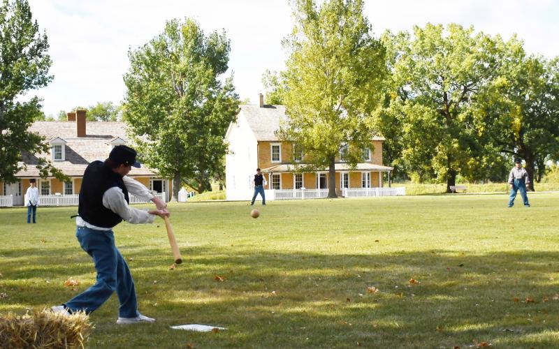 As the Fort Sisseton Harvest Festival wrapped up Sept. 21, an 1864 style game of baseball was played with the players acting as Union soldiers who would have been present at Fort Sisseton. Here, the hurler now known as a pitcher tosses the ball underhand to the batsman. Reporter &amp;amp; Farmer | Brenner Cariveau