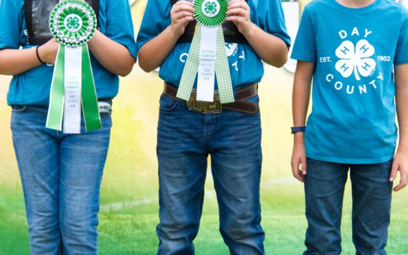 Beginner goat showmanship winners at the Day County Fair Aug. 8 are, from left, grand champion Julia Ogren, reserve champion Isaac Ogren and third place Corbin Huffman.