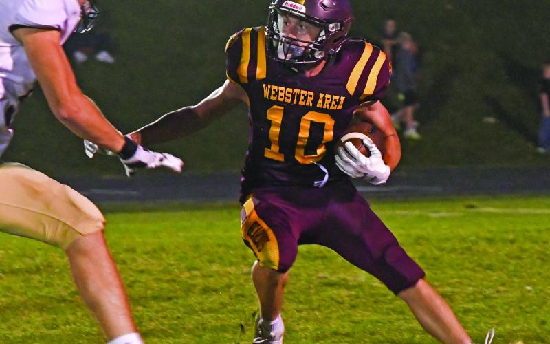 Henry Witt (10) runs the ball during Webster Area’s 8-22 loss against Milbank Oct. 3 in Webster. Bearcats leading rusher for the game was Matthew Mount with four carries for 25 yards and a touchdown. Reporter &amp;amp; Farmer | Amanda Dulitz