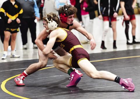 Webster Area wrestlers competed at the MVPCS Invitational in Plankinton Dec. 21. Here, Webster Area wrestler Haeden Jorgenson competes against Gavin Braun from Kimball/White Lake/Platte-Geddes in the first place match for the 138 pound weight class. Reporter &amp; Farmer | Dax Jorgenson