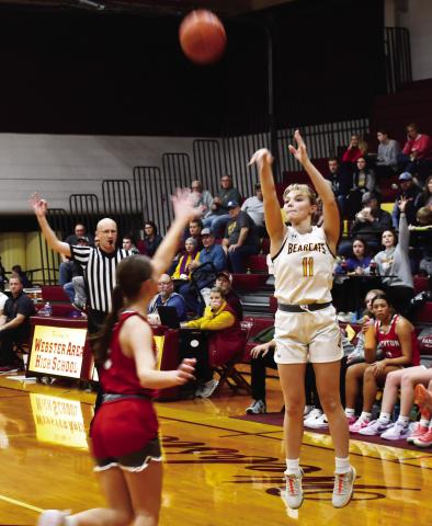 Webster Area girls basketball hosted Britton-Hecla Dec. 20 at the Webster Armory. Bearcats won the contest 50-29. Here, Webster Area guard Lydia Vogl (11) shoots a three pointer while Britton-Hecla defender Heather Storbakken (3) closes out to the three point line. Reporter &amp; Farmer | Brenner Cariveau