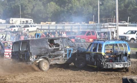 Many people flocked to the Day County Fairgrounds Aug. 10 for the demolition derby that took place in the evening. The derby proved to be an adrenaline filled event as old cars continuously rammed into each other. Between car-fires, flying car parts and a roaring crowd it is safe to assume that the event was on a collision course for success as it becomes a staple of the Day County Fair. Reporter &amp; Farmer | Brenner Cariveau