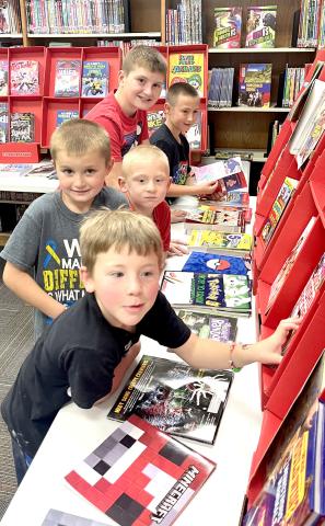 Front to back, Rogan Rithmiller, Brody Shafer, Landon Kvernevig, Cruz Shafer and Eli Ploof enjoyed looking through the selections at Webster Area School’s bookfair Oct. 7-10. Reporter &amp; Farmer | Subscriber snapshot