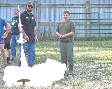 Day County Fair started Aug. 5 and continued throughout the weekend until Aug 9. To kick off the fair, Day County youth launched their rockets and spent the evening watching their creations reach the skies. From left, Kelsey Fischer watches Connor Fischer help Abel Bloom launch one of their bigger rockets. Reporter &amp; Farmer | Connor Handrahan