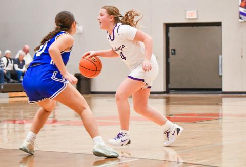 Brynlee Amdahl (4) of Waubay/Summit dribbles up the court during Mustangs 65-42 win against Elkton-Lake Benton Lady Elks Feb. 7 in Summit. Waubay/Summit moves to a record of 15-2 on the season. Reporter &amp; Farmer | Leyton Beardslee