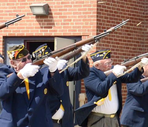 Shots were fired in a 21-gun salute to fallen veterans during the Webster Memorial Day program at the Webster Armory May 27. Members of the VFW and American Legion Honor Guard shown here are Tom Lewno, Doug Lynch and Ed Damrau. Reporter &amp; Farmer | Amanda Dulitz