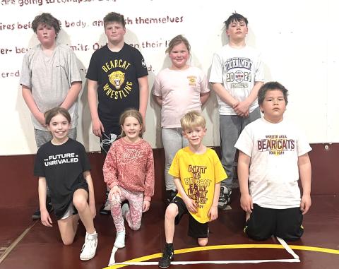 Bearcat AAU wrestlers competed in the Region 4 wrestling tournament in Brookings March 15 with a spot to compete at the state level up for grabs. Eight of the 17 Bearcats who competed in the tournament advanced to the state tournament in Rapid City March 29-30. Pictured from back left, Bryson Johnson, Kane Baumgarn, Emerie Schlechter, Karstyn Schlechter. From front left, Finley Marko, Adeline Johnson, Camdyn Huffman, Hunter Fellbaum.
