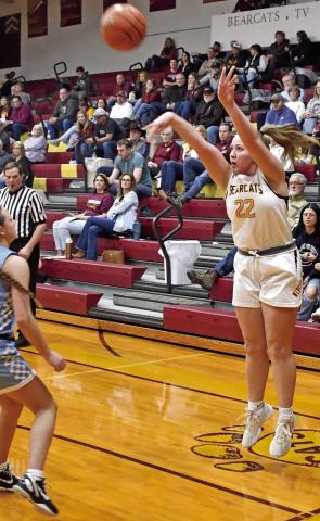 Webster Area girls basketball faced the Hamlin Chargers at the Webster Armory Jan. 16 which ended in a Bearcat loss 28-68. Here, Bearcat Bailee Ninke (22) shoots a corner three while a Hamlin defender rushes to close out. Reporter &amp; Farmer | Robert Dulitz