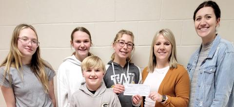 Webster Area Student Council members, front Barrett Bloom, fourth grade; back, from left, eighth graders Claire Halvorson, Sophia Wilson and Remi Hubsch presented a $1,000 check to playground committee members Vanessa Bloom, fifth grade teacher and Emily Wagner, second grade teacher. Funds were raised through last fall’s Driven Coffee fundraiser and will support the new playground and gym floor project. Reporter &amp; Farmer | Subscriber snapshot