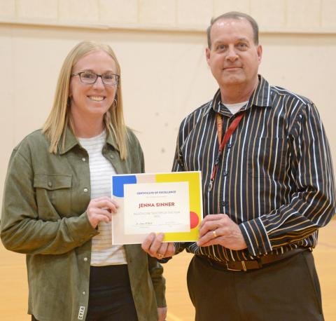 Jenna Sinner was announced last week as the Region 1 Teacher of the Year during an assembly at Webster Area High School April 23. Sinner was presented a certificate by Webster Area Superintendent Jim Block who explained he had just received notification that morning of Sinner’s award from the state. Reporter &amp; Farmer | Amanda Dulitz