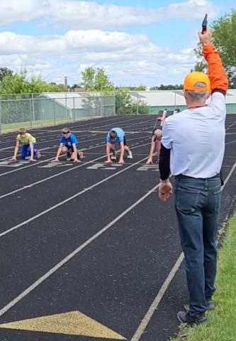 Webster Area Youth Track and Field Meet took place June 29. Robert Kwasniewski raises the starting gun for the boys ages 11-12 100 meter race. Kwasniewski volunteered his time as the official starter of the meet. Runners pictured from left are Colton Hanson, Cooper Gangle, Tak Lesnar and Hunter Sinner. According to event organizer Brandy Gangle, almost 40 kids participated and she plans to continue putting on the event in future years. Reporter &amp; Farmer | Subscriber snapshot