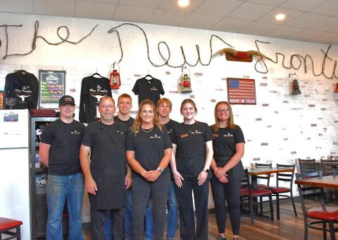 The New Frontier Steakhouse &amp; Lounge is standing proud on Webster’s Main Street. With fresh steak and friendly support staff, The New Frontier welcomes everyone. From left, Caleb Gaikowski, Aaron Gaikowski, Aiden Gaikowski, Kristi Gaikowski, Gabriel Gaikowski, Alivia Kuecker and Ava Bjerke.