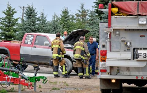 Webster firemen responded to report of a vehicle fire July 31 in Webster near the north entrance of the Northside Implement parking lot. By the time they arrived, however, employees from the nearby business had extinguished the flames in the engine compartment of the vehicle. Reporter &amp; Farmer | Amanda Dulitz