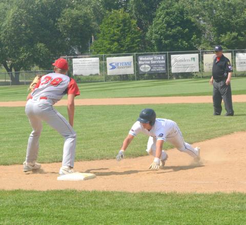 Webster Post 40 competed in the Legion Region tournament July 21-22. This was Post 40’s first game of the tournament and they played against Britton Lumberjacks. Here, Chase Gregerson can be seen sliding into first after almost getting picked off at first. Reporter &amp; Farmer | Connor Handrahan
