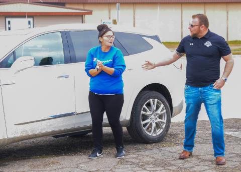Jaynie Barse holds a set of keys to a new-to-her 2023 Buick Enclave, which she was gifted from Northland Auto Nov. 1. Northland Auto Vice President Nick Johnson, pictured at right, made the presentation to the Webster mother of seven. Reporter &amp; Farmer | Connor Handrahan