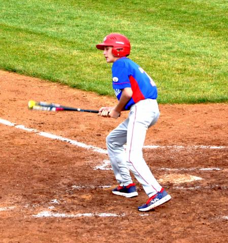 Reporter & Farmer | Luke Caputo Webster’s VFW Post 4690 Hudson Lesnar swings against the Milbank Junior Teeners June 20.