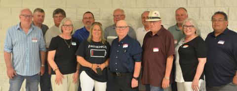 Celebrating 50 years, front, from left, Rich Herrick, DeeDee Raap, Margie Gruba, Al Bell, Barry Gronke, Gwen Kampa, Jesse Larsen; back, Duane Axness, Kenny Ewalt, Elroy Streier, Craig Schmidt and Curtis Samson. Reporter &amp; Farmer | Luke Caputo