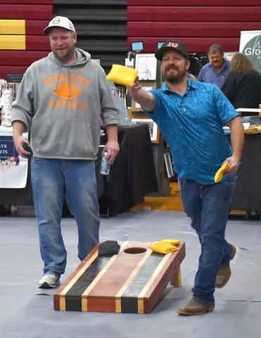 The annual German Fest was held Sept. 26 and attending community members enjoyed a day full of fun with vendors, German food and drinks, games and a corn hole tourney. Chris Spiering, left, and AJ Meland continue to play bean bags after the tournament finishes. Reporter &amp; Farmer | Connor Handrahan