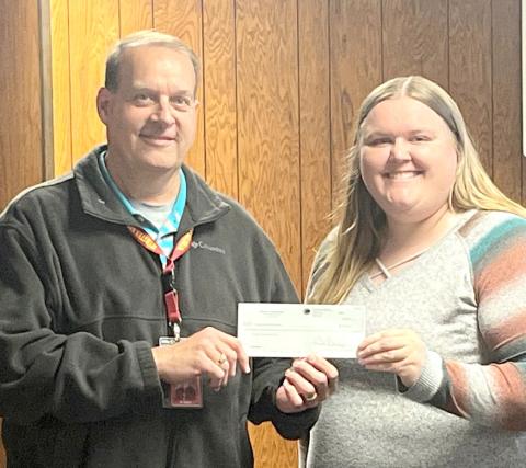 Kayla Kirchmeier, Webster Kiwanis vice president, presented a check for over $9,400 to Webster Area School Superintendent Jim Block Funds were raised by selling concessions at home sporting events. Reporter &amp; Farmer | Subscriber snapshot