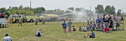 Summit Fire Department was the winner of the annual Fireman’s Water Fight in Waubay last weekend during the Waubay Fun Fest activities. Pictured, a crowd watches as a Summit team goes up against a team from the Waubay Fire Department. Reporter &amp; Farmer | Subscriber snapshot