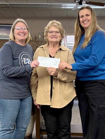 Roslyn Area Veterans Memorial Park was recipient of matching funds from Modern Woodmen following November’s fundraising event. Pictured from left are promoter of the fundraising effort Shelley Deutsch, Modern Woodmen activities coordinator Bernie Kurkowski and Roslyn Area Veterans Memorial treasurer Jessica Simonson. Plans are to use the funds for landscaping expenses. Reporter &amp; Farmer | Subscriber snashot