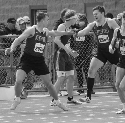 Gavin Witt takes the batton from Carson Mount during a relay race at the Howard Wood Dakota Relays track meet May 3-4. Reporter &amp; Farmer | Subscriber snapshot