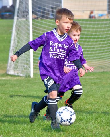 Knox Baumgarn takes the ball upfield followed by teammate Jackson Meyer during a soccer game in Webster May 1. The boys play in the Webster Area Soccer spring league that runs through May 22. See story from page 1. Reporter &amp; Farmer | Leyton Beardslee