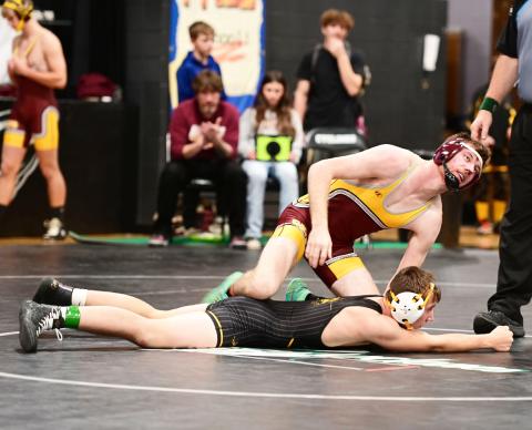 Webster Area Bearcats wrestling season started Dec. 7 with the CWL Booster Club wrestling tournament at Clark High School. Here, Webster Area wrestler Trace Shoemaker lays his knee on the back of his opponent. Reporter &amp; Farmer | Subscriber Snapshot
