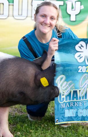 Allison Meland pictured with her reserve champion market swine also won breeding swine reserve champion at the Day County Fair Aug. 7. Reporter &amp; Farmer | Leyton Beardslee