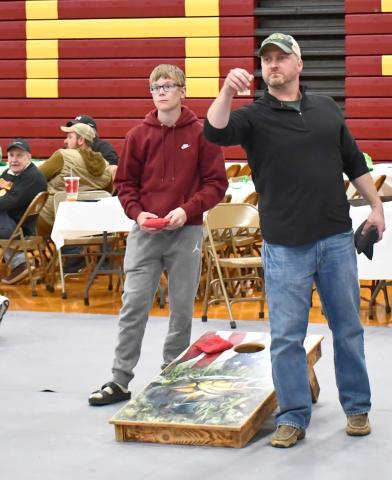 The annual Shake your Shamrock event in Webster was held on the rescheduled date April 25. Here, Maverick Coester and Morgan Dorsett battle back and forth for the first points of the finals in a cornhole tournament at the event. Dorsett and his partner Martin Dorsett ended up taking first place at the event. Other activities were held throughout the day. Reporter &amp; Farmer | Connor Handrahan
