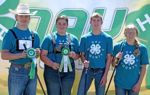 Senior 4-H showmanship winners for beef are, from left, grand champion Caleb Gaikowski, reserve grand champion Adaline Larson, Gabriel Gaikowski and Brooke Meland. Reporter &amp; Farmer | Amanda Dulitz