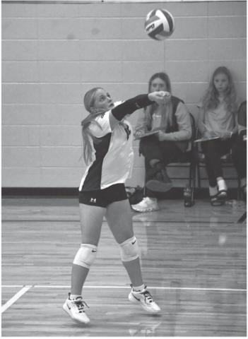 Gracia Althoff of Waubay/Summit receives the ball during the Mustang’s match against Britton-Hecia Oct. 7 in Waubay. Waubay/Summit lost the match 0-3 with set scores of 16-25, 23-25 and 21-25. Reporter &amp; Farmer \\ Leyton Beardslee