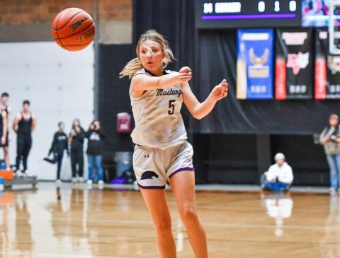 Liza Purdy (5) of Waubay/Summit swings a pass to the corner during the Mustangs 32-38 SoDak 16 loss to Corsica-Stickney Jaguars March 5 in Huron. The loss ended the girls season with a record of 20-3. See full story on page 7. Reporter &amp; Farmer | Leyton Beardslee