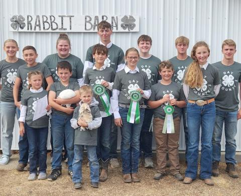 Participating in the Day County Fair 4-H rabbit show are in front Sawyer Zenk; from left, middle, Ava Schulz, Logan Wik, James Schulz, overall grand champion Raelee Ellingson, Abel Bloom, Carlee Wik; back, Brooke Grajczyk, Shawn Grajczyk, overall reserve champion Kelsey Fischer, Gage Wik, Carson Fischer, Michael Dorsett and Martin Dorsett. Reporter &amp; Farmer | Subscriber snapshot