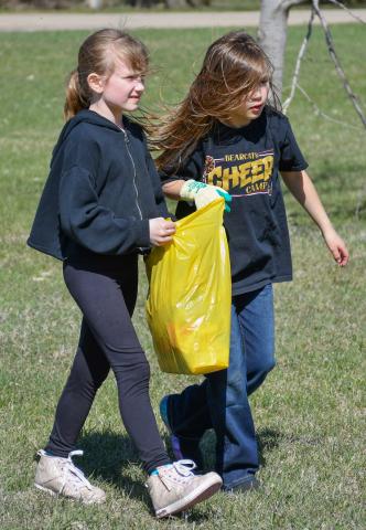 Members of several Webster Girl Scout troops gathered at the Webster Girl Scout Park April 22 for Earth Day where they spent time collecting loose garbage and trash to clean up the public space. Pictured are Olivia Ewing and Ava Schulz. Fourteen girls from kindergarten to third grade made up the group of Daisy and Brownie troops. Reporter &amp; Farmer | Amanda Dulitz