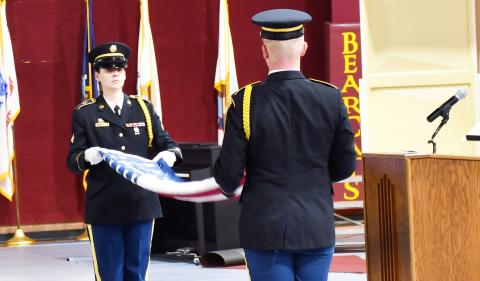 A Veterans Day event was held at the Webster Armory Nov. 9 where members of the South Dakota National Guard performed a funeral honors ceremony. Pictured left is Sergeant Ashley Shultz, who is a funeral honors coordinator aiding in folding the American flag with Staff Sergeant Jaymz Long who is a member of the Watertown National Guard Readiness Center. Reporter &amp; Farmer | Brenner Cariveau