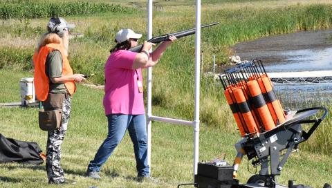 Tina Dokken, left, coaches Michele Markie in clay bird shooting Aug. 22 at the fourth annual Women on the Wing event, when 30 women came together to learn the techniques of hunting and shooting. Reporter &amp; Farmer | Timothy Gibson