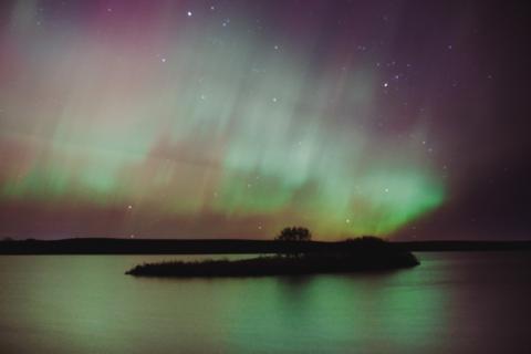 Aurora borealis lights shimmer in the sky north of Webster Nov. 11 along SD Hwy. 25, over a body of water. Reporter &amp; Farmer | Leyton Beardslee