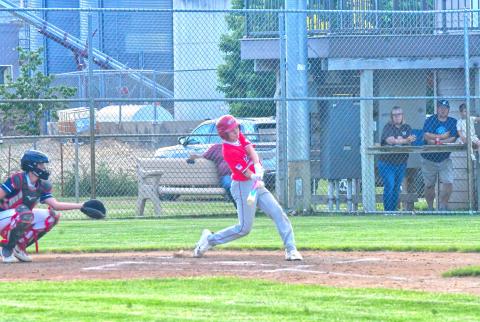 Bennett Kuecker hits a single during Webster Teeners’ first game against Lake Norden June 5. Kuecker was one of 11 runs to be scored in the first inning, which eventually led to a 16-6 victory. Reporter &amp; Farmer | Connor Handrahan