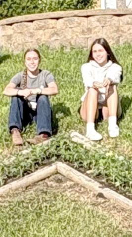 Webster Girl Scouts Macee McGregor and Jaden Lorensberg planted flowers at the “W” on the Lake Region Electric hill. Reporter &amp; Farmer | Subscriber snapshot