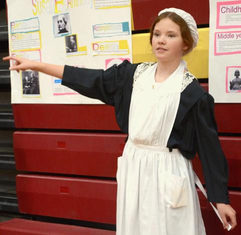 Members of Webster Area Elementary’s fifth grade class put on the annual living wax museum May 3 at Webster Armory. The event was open to the public to watch and listen to students tell about the historical character they had studied and were portraying. Shown here, Arianna Altstadt tells details of the life of Florence Nightingale. Reporter &amp; Farmer | Kole Rithmiller