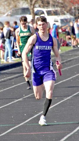Tigh Gaikowski races in a relay at the Britton Track meet April 22. Reporter &amp; Farmer | Subscriber snapshot