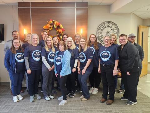 Sanford Webster Medical Center employees are, from front left, Kim Kaufman, Dr. Elizabeth Gravley, Lori Reetz, Sue Hoven, Melanie Opitz, Ashley Ewing, Sheryl Grout and Molly Ramsey. Back row, from left, is Brad Olson, Amanda Paszek, Casey Zochert Huffman, Denise Below, Sarah Vergeldt, Missy Bartelt, Kasey Decker, Nicole Johnson and Bryce Sichmeller.