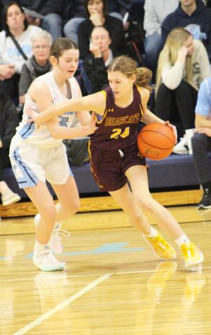 Webster Area Bearcats girls basketball squared off against Leola/Frederick Area Titans on the road Feb. 15. Bearcats prevailed in the contest with a final score of 5625. Here, Cartney Hanson (24) escapes pressure from Titans defender Eden Podoll (15). Reporter &amp; Farmer | Subscriber Snapshot