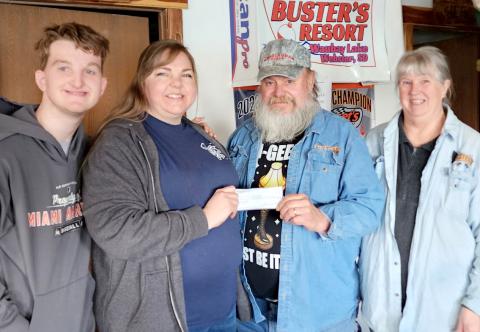 Buster’s Resort, rural Webster donated fundraising proceeds of $1,369 to Pierpont Fire Department. Pictured, from left, are fire department representatives Cameron Feist and Stacey Knutson accepting the donation from Buster and Peggy Sichmeller. Reporter &amp; Farmer | Subscriber snapshot