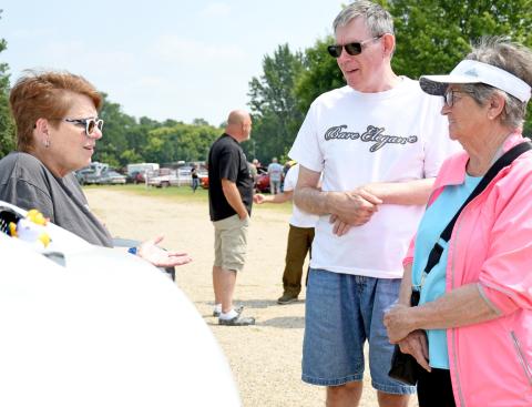 (Above) Christy Brubaker of Aberdeen speaks with Ron Hinze of Arizona and his mother Della Hinze of Webster during the Day County Fair Car Show Aug. 10. Showing her 2020 Jeep Wrangler, Brubaker told passersby the story of the Ducking Kindness movement, which is believed to have started during World War II and is associated with Jeep vehicles. Reporter &amp; Farmer | Amanda Dulitz